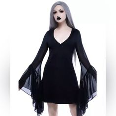 This Is A Brand New Killstar Dress, “Black Veil Bodycon” In Size Medium. This Dress Was Purchased Years Ago From Their Website So It’s No Longer Available. Never Got Around To Wearing It Or Even Trying It On. Took It Out Of The Bag To Photograph And Identify It. This Doesn’t Really Look Like A “Bodycon” Dress. Looks To Be More Traditional A-Line. Sleeves Are Huge With Ruffles And Soft Mesh. Beautiful Staple In Any Goth Or Alternative Closet!! Gothic V-neck Dress For Night Out, Gothic V-neck Mini Dress For Party, Gothic V-neck Evening Dress, Witchy Mini Dress For Party, Fitted Long Sleeve Witchy Mini Dress, Black Long Sleeve Witchy Mini Dress, Witchy Fitted Long Sleeve Mini Dress, Witchy Long Sleeve Dresses For Night Out, Witchy Long Sleeve Fitted Mini Dress