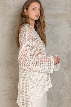 Throw on the Lucky in Love White Oversized Crochet Sweater for a cute and easy outfit! Off-white crochet shapes this oversized sweater with wide bell sleeves, a boat neckline, and a high-low hem. Pair with flare jeans for a boho look. DETAILS & CARE 55% Polyester, 45% Acrylic. Dry Clean or Machine wash cold. Imported. Oversized Crochet Sweater, White Crochet Sweater, Crochet Shapes, Sheer Cover Up, Boho Pink, Easy Outfit, Lucky In Love, Pink Boho, Boho Look