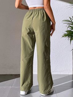 Stay effortlessly stylish with our Casual Plain Cargo Cropped Pant. These pants feature a cropped length and a clean, plain design, offering a versatile and contemporary style. With a relaxed fit and comfortable fabric, they are perfect for casual and everyday wear. These cargo cropped pants are a must-have addition to your wardrobe for a trendy and laid-back look.Specification: Style: Casual Pattern Type: Plain Type: Cargo Pants Closure Type: Elastic Waist Details: Pocket Waist Line: Natural Le Casual Workwear Cargo Pants With Elastic Waistband, Casual Cargo Pants With Elastic Waistband For Work, Spring Utility Sweatpants With Relaxed Fit, Spring Utility Style Relaxed Fit Sweatpants, Sporty Straight Cargo Pants For Spring, Spring Baggy Solid Color Cargo Pants, Spring Baggy Cargo Pants In Solid Color, Casual High Waist Solid Color Cargo Pants, Sporty Straight Leg Summer Cargo Pants