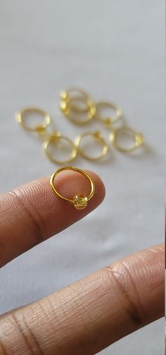 8pcs 12mm Gold Hair Rings With a Gold Accent Bead Perfect For Dreadlocks, Braids, Twist, Plaits, Buns & Up-dos -Add hair rings to a variety of hair styles for a classic and unique look. Simply open ring by twisting gently sideways. Apply to desired location then gently twist back together. Do not pull apart, this may cause the ring to loose its shape. Caring for most jewelry jewelry... Depending on the type of jewelry purchased, be sure to remove any jewelry before you bathe, wash your hands Gold Hair Rings, Braid Rings, Dreadlocks Braids, Braids Twist, Iron Jewelry, Loc Jewelry, Braided Ring, Dreadlock Hairstyles, Hair Rings