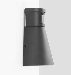 a gray wall mounted light on the side of a white wall