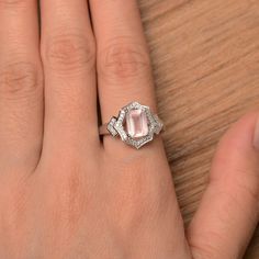 It is a natural pink quartz ring. The main stone is 6 mm*8 mm emerald cut.weight about 1.43 carats The basic metal is sterling silver and plated with rhodium. To change the metal to a solid gold (white/rose) or platinum is also available, please ask for a quotation if you want. You can also go to my shop Home for more elegant rings: https://www.etsy.com/shop/godjewelry?ref=hdr_shop_menu More pink quartz rings: https://www.etsy.com/shop/godjewelry?section_id=22545141 Customization is always welco Rainbow Topaz Ring, June Birthstone Ring, Spinel Ring, Sterling Silver Wedding Rings, Etsy Wedding Rings, Silver Wedding Rings, Pink Gemstones, Elegant Ring, Affordable Jewelry