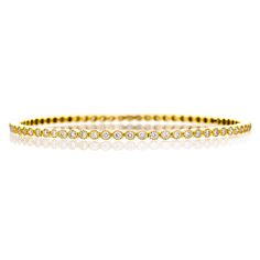 The Bezel White Diamond Bangle is a soft touch to your wardrobe, with repetition of round milgrain-finished bezel settings to keep the sparkle aglow. 18K Yellow Gold 73 Brilliant Cut White Diamonds Total Diamond Weight: 2.65ct Bangle Diameter: 2.5" Classic Bezel Setting Tennis Bracelet For Formal Occasions, Classic Wedding Tennis Bracelet With Bezel Setting, Classic Round Tennis Bracelet With Bezel Setting, Classic Round Bangle With Diamond Accents, Classic Yellow Gold Tennis Bracelet With Bezel Setting, Classic Tennis Bracelet With Bezel Setting, Timeless Hand Set Round Gold Bracelet, Luxury Round Bangle With Bezel Setting, Classic Gold Bangle With Bezel Setting