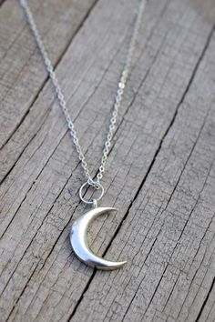 High quality necklace Celestial Jewelry Crescent Moon Necklace Crystal Necklace Statement Necklace Jewelry Women Valentine Gift by Geminimalist. It is a Solid 925 Sterling Silver Crescent Moon Necklace which Makes it a perfect desirable gift for special women in your life. Even it adds up some compliment in your beauty. ✧ WHAT YOU WILL GET *Size of Pendant18-20mm long *HIgh Grade Solid 925 Sterling Silver. *Hypoallergenic metal is used in the Necklace. *Thickness of the chain is 3mm(approx.) *Tr Silver Dainty Moon Charm Necklace, Minimalist Crescent Charm Necklace With Clavicle Chain, Minimalist Crescent Clavicle Chain Charm Necklace, Dainty Silver Necklace With Moon Charm, Minimalist Crescent Moon Phase Charm Necklace, Sterling Silver Half Moon Charm Necklace, Dainty Necklace With Half Moon Charm, Dainty Half Moon Necklace With Moon Charm, Minimalist Half Moon Phase Necklace