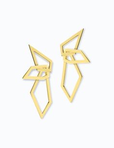 Modern edge. This pair of earrings features a multi-geometric design made of yellow silver and interlocking shapes. A subtle statement piece. #Minimalistic #Simple #Chic #Elegant #Luxury #Modern #Fashion #Regram #Classy #Trendy #Jewelry #angle #rings #collections #new #style #fashion #ootd #lookbook #newlook #accessories #silver #gold #geometricjewelry #gift Cheap White Geometric Jewelry, Elegant Yellow Gold Geometric Earrings, Modern Geometric Pierced Earrings, Elegant Geometric Pierced Earrings, Modern Geometric Linear Earrings For Gifts, Modern White Geometric Earrings, Modernist Geometric Jewelry For Formal Occasions, Modern Geometric Earrings For Pierced Ears, Gold Geometric Earrings For Formal Occasions