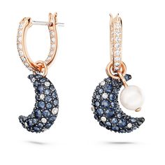 These radiant Sublima earrings are a chic tribute to the reflections and shadows of the moon. The rose gold-tone plated design features an elegant pair of crescent moons, each embellished with a pavé of crystals in dark tones, hanging from dazzling mini hoops. One earring holds a detachable pearl. A perfect choice, whatever phase of style you’re in. Blue Crystal Earrings, Swarovski Crystal Jewelry, Mini Hoop Earrings, Swarovski Jewelry, Crystal Drop Earrings, Opal Necklace, Crystal Pearls, Metal Bracelets, Jewelry Rings Engagement