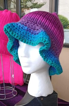 Handcrafted colorful pink purple & blue Bucket Hat  Size: Fits Teens & Adults Craftsmanship: Expertly knitted and crocheted with precision and care. Design: Colorful ombre design with a flowy brim Materials: Made with high-quality, vegan-friendly acrylic yarns. Ethos: Proudly woman-owned business, crafting with compassion and eco-conscious practices. Embrace your style with this colorful bucket hat, meticulously handcrafted for comfort and flair.  💚 visit my shop for more💚 https://www.etsy.com/shop/HandmadebyHollyween Purple Adjustable Crochet Hat, Adjustable Purple Yarn Crochet Hat, Adjustable Purple Crochet Yarn Hat, Purple Crochet Yarn Hat, Handmade Purple Beanie Hat, Purple Hand Knitted Adjustable Hat, Hand Knitted Purple Hat, Hand Knitted Purple Hat One Size, Adjustable Hand-knitted Purple Hat