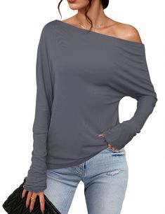 PRICES MAY VARY. 【 Asymmetrical Top】: Sexy Off Shoulder Tops Women. Shirt falls off the shoulder giving a sexy look, while with extra long sleeves gather at the wrists for added edge. Trendy, lightweight top featuring an asymmetrical off-shoulder design Add a touch of elegance to your wardrobe with this effortless piece 【Lightweight, Soft & Stretchy Fabric】 ：Show off some skin and keep things cozy in this comfy off shoulder top. The material is soft ,drapes well and high-stretches. Lightweight , Non-stretch Solid Color Top For Night Out, Casual One-shoulder Top In Plain Color, Casual Solid Color One Shoulder Top, Casual Solid Color One-shoulder Top, Fitted One Shoulder Solid Color Top, Fitted Solid Color One-shoulder Top, Fitted One-shoulder Solid Color Top, Asymmetrical Gray Top For Fall, Stretch One-shoulder Top For Fall