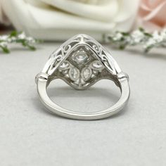 This beautiful ring is made from genuine 925 sterling silver with rhodium plating. Ring details- -The Main stone is a round cut 4mm Simulated Diamond -Side stones are 4mm by 2mm Marquise and 1.5mm Round simulated diamonds -Ring is casted in solid 925 sterling silver with rhodium plating (yellow gold and rose gold plated also available, please check the drop down menu for more options) -The Total face height of the ring measures 16mms and the band width measures 5mms -Each ring is handmade and ma Diamond White Sterling Silver Wedding Birthstone Ring, Diamond White Sterling Silver Birthstone Wedding Ring, Classic Silver Rings With Diamond Accents, Diamond White Sterling Silver Birthstone Ring For Wedding, Wedding Sterling Silver Diamond White Birthstone Ring, Wedding Birthstone Ring In Diamond White Sterling Silver, Silver Sterling Silver Halo Ring For Promise, Cubic Zirconia Cluster Ring For Anniversary, Elegant Dome Ring For Promise