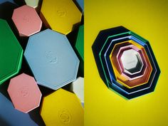 an assortment of different colored hexagonal objects