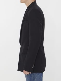 Fitted jacket in black wool. It features shoulder pads, single-breasted closure with a single silver-tone embossed button, classic lapels, two side flap pockets, a welt pocket on chest and silver-tone embossed buttoned cuffs. The model is 188cm tall and wears size IT 50.  Size nationality: IT  Product number: 5500457  Product code: BH1SE035WC090PA  Composition: 100% virgin wool Fitted Jacket, Platform Wedge Heels, Workout Jacket, Dress With Cardigan, Couture Collection, Clothes Collection, Cardigan Jacket, Wool Jacket, Black Wool