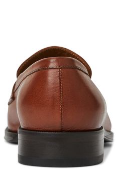 A lightly cushioned footbed brings impeccable comfort to a smooth leather loafer handmade in Italy. Cushioned footbed Leather upper, lining and sole Made in Italy Brown Calf Leather Driving Loafers, Luxury Cognac Loafers For Semi-formal Occasions, Luxury Brown Loafers, Cognac Shoes, Semi-formal Brown Loafers With Stitched Sole, Penny Loafers Men, Brown Loafers With Rubber Sole, Medium Width, Bruno Magli, Penny Loafer