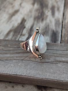 NOTE : WE USED NATURAL GEMSTONES , SO STONE MAY BE LITTLE DIFFERENT .This is a listing of Boho sterling silver ring # metal = sterling silver 925 # Gemstone - Rainbow Moonstone # Ring Size - Available in all Size # Stone Color - Rainbow # Stone Shape - Tear Drop Handmade Crafting bohemian Ring - This style has bohemian style . it will look beautiful when you wear it .. Thanks for visiting our shop ... favorite our shop for daily updates ... Handmade Moonstone Toe Ring As A Gift, Silver Teardrop Jewelry For Summer, White Moonstone Ring For Promise, Minimalist Handmade White Moonstone Ring, White Handmade Minimalist Midi Rings, Minimalist Handmade White Midi Rings, Minimalist Rings For Summer Gifts, Minimalist Midi Rings For Summer Gift, Minimalist Midi Rings As Summer Gift