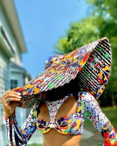 "Keep it cute and chic in our \" Massive Oversized Floppy Kente Print Sun Hat\" this season. This is a one size fits all, lightweight, durable and uniquely sewn hat made from high quality African Ankara print. This hat may help keep your face shaded from the sun as you embark on a full day outdoors and it is sure to turn heads wherever you choose to wear it to. The possibilities are endless with this beautiful well constructed hat! It's the perfect look for your summer vacation, baecation, weeke Spring Multicolor Bucket Hat With Uv Protection, Multicolor Uv Protection Bucket Hat For Spring, White Fitted Hat For The Beach, One Size Bucket Hat For Beach Season Vacation, Beachwear Bucket Hat With Upf 50+, White Fitted Hat For Beach, Beachwear Sun Hat With Upf 50+ Bucket Style, Multicolor Straw Hat For Summer Festivals, Fitted White Beach Hat