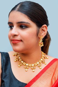 Description: Elegant and charming Gold Plated Royal Kundan Necklace Set. This is a stylish set in a golden tone. This set will work well with traditional, formal, and western formal. This is a finely detailed set, that will make you stand apart from everyone in the room. About: Eye-catching and unique jewelry that will set you apart. Gift this piece to a loved one and see their face light up with joy. Best for gifting or for personal use, wear it to any occasion and become the spotlight. Jewelry Western Formal, Western Gowns, Kids Handicraft, Sequence Blouse, Indo Western Gown, Saree Petticoat, Saree Jewellery, Kundan Necklace Set, Silver Pooja Items