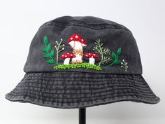 Item: mushroom embroidered bucket hat Material: 100% cotton Size: one size fits most Embroidery: hand made with acrylic thread Free first class shipping, upgradable priority mail service. 30 days return policy, feel confident at your purchase! Novelty Outdoor Bucket Hat, Embroidered Curved Brim Hat For Outdoor, Outdoor Embroidered Hat With Curved Brim, Whimsical Cotton Cap, Embroidered Adjustable 5-panel Hat, Adjustable Embroidered 5-panel Hat, Embroidered Adjustable Bucket Hat, Handmade Cotton Hats For Outdoor, Handmade Cotton Outdoor Hats