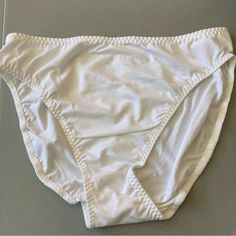 Pack Of 10 White Bikini Panties | Nwt Style: 5051 Description: Bikini Color: White Size: Large And Medium Material: 75% Antron And 25% Spandex Smoke And Pet Free Home White Stretch Bottoms For Pool, White Stretch Swim Trunks For Beachwear, White Brief Swim Trunks For Beach, White Stretch Swimming Bottoms, White Fitted Swim Trunks For The Beach, White Brief Bottoms For Poolside, White Beach Bottoms In Brief Style, White Beach Brief Bottoms, White Brief Bottoms For Beach