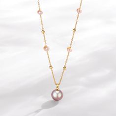 Fall in love with House of Pearls’ timeless, classic teardrop pendant necklace. Crafted from 14K gold-filled metal and freshwater pearls, this piece is perfect for a night out or day in. The white and purple pearls have a unique and special hue that will make anyone stop, stare, and ask where you got it. Get your hands on this best-selling necklace and make a statement every time you wear it. 14k Gold Filled Freshwater Pearl Necklace This glamorous necklace features shimmering white freshwater p Baroque Pearls Necklace, Celine Earrings, Purple Style, Mother Of Pearl Earrings, Baroque Pearl Earrings, Purple Pearl, Gold Pearl Necklace, Freshwater Pearl Bracelet, Pearl Leather