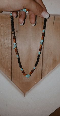 Black Necklaces With Colorful Beads For Beach, Handmade Black Hippie Necklaces, Black Handmade Hippie Necklace, Handmade Black Hippie Necklace, Handmade Hippie Black Necklace, Casual Brown Beaded Necklaces With Colorful Beads, Brown Beaded Necklace With Black Beads As Gift, Brown Beaded Necklaces With Black Beads For Gift, Black Necklaces With Large Beads For Beach