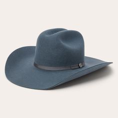 This western-inspired fashion hat brings a welcome pop of Cowboy Core to any look. Its classic silhouette features a 4 5/8" cattleman crown, 4” brim and grosgrain hat band. Handmade in the U.S.A. with a firm finish from high-quality wool felt, it’s finished with a moisture-wicking DRI-LEX® sweatband and satin liner for a comfortable, all-day fit. 4 5/8" Cattleman Crown 4" Brim Grosgrain Hat Band DRI-LEX® Absorbent Sweatband Satin Liner Firm Finish 100% Wool Handmade in the U.S.A. Blue Felt Hat, Country Style Hat With Flat Crown For Country Events, Western Wide Brim Fitted Hats, Fitted Wide Brim Western Hats, Rigid Flat Brim Hat For Country Events, Classic Flat Crown Hat Bands For Western-themed Events, Classic Flat Crown Hat Bands For Western Events, Classic Brimmed Top Hat For Rodeo, Western Hat With Curved Brim