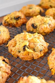 cornflake cookies cooling on a rack with the words cornflake cookies above it