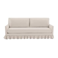 a white couch with ruffles on the bottom and back ends, against a white background