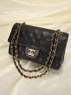 CONDITION:?ÿGOOD VINTAGE . Bringing to the shop a stunning, soft classic Lambskin Chanel flap. Excellent investment piece that?ÿcan be loved for years to come. Vintage Chanel crafted in the 90's= 24k hardware and soft buttery lambskin. Don't miss out on this gorgeous find. Can be  as a long or short shoulder bag. Crafted between 1991-1994. Bag in this condition going online for $4800+. Please note: Hairline scratches on logo. Rubbing on edges as pictured. Hardware is in beautiful yellow gold condition! Please review all pics and ask any questions prior to purchasing!  To prevent any form of fraud, I?ÿkeep video records of?ÿmyself?ÿpackaging?ÿand dropping off each order, and?ÿall?ÿorders ship with?ÿtracking and?ÿsignature?ÿconfirmation. Please ensure your shipping address is correct as we a Vintage Chanel Purse, Chanel Vintage Bag, Vintage Chanel Bag, Girl Backpacks School, On Logo, Soft Classic, Bottega Veneta Shoulder Bag, Girl Backpacks, Vintage Chanel