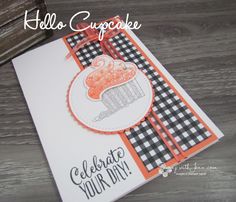 a close up of a card with the words hello cupcake on it and an orange ribbon