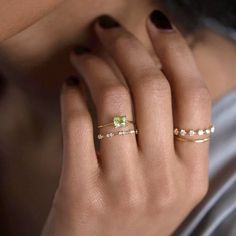 Welcome to TimelessTouchesGoods, where every piece tells a story of elegance and charm. Discover our Peridot Ring in 14k Gold Plated Color, a birthstone promise in 925 Sterling Silver, meticulously crafted to adorn your special moments. ✨ Luxury Redefined: Elevate your style with our Peridot Ring, featuring a square green crystal set in 925 Sterling Silver and bathed in the brilliance of 14k Gold Plating. This piece exudes luxury, making it the perfect wedding band for bridal girls and a strikin Gold Stackable Rings With Peridot Birthstone, Dainty Peridot Promise Ring, Dainty Peridot Ring For Gift, Dainty Peridot Ring Gift, Dainty Gold Solitaire Emerald Ring, Elegant Peridot Gemstone Stackable Rings, Gold Gemstone Midi Rings For Anniversary, Elegant Citrine Solitaire Ring, Elegant Peridot Stackable Rings For May Birthstone