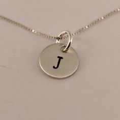 Petite Sterling Silver Personalized Initial Charm Necklace - Hand stamped Silver Hand Stamped Round Pendant Jewelry, Silver Hand-stamped Round Pendant Jewelry, Meaningful Hand Stamped Sterling Silver Charm Necklaces, Meaningful Hand Stamped Sterling Silver Charm Necklace, Sterling Silver Hand Stamped Pendant Charm Necklace, Everyday Sterling Silver Charm Necklace With Box Chain, Silver Hand Stamped Meaningful Charm Necklace, Round Sterling Silver Nickel-free Charm Necklace, Sterling Silver Hand Stamped Pendant