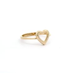 Experience the simplicity and elegance of our heart outline ring. Crafted from 14k yellow gold, this delicate ring features a timeless heart outline design that will add a touch of love and sophistication to any outfit. A must-have for any jewelry collection! Metal: 14k GoldType: RingSize: 6.5 Minimalist Open Heart Ring, Minimalist Open Heart Promise Ring, Minimalist Heart Ring With Open Heart Charm, Minimalist Open Heart Ring With Heart Charm, Classic Open Heart Rings For Valentine's Day, Minimalist Open Heart Gold Ring, Yellow Gold Open Heart Ring For Valentine's Day, 14k Gold Rings With Heart Charm, Everyday Yellow Gold Heart Charm Ring