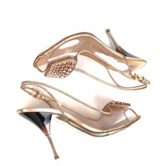 "clear plastic vinyl with gold leather trim by Prada made in Italy Gently worn, loss of gold color on trim and heel edge, metal spike heel with amber resin heel accent. All rhinestones are there, no damage , only marks and signs of normal wear. 9 7/8\" insole 3\" heel 3 \"sole width Leather sole" Chic Gold Heels With Metal Feet, Gold Open Heel Cocktail Heels, Gold Open Heel Heels For Events, Chic Gold Cocktail Heels, Chic Evening Heels With Metallic Accents, Gold Heels With Metal Feet For Evening, Designer Gold Open Toe Heels, Glamorous Party Heels With Metal Feet, Glamorous Gold Open Heel Heels