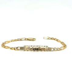 Cherish the Moment with our 14k Yellow Gold Kids ID Bracelet: Crafted in the timeless Solid Figaro style links, this bracelet is a symbol of Elegance and Love. We believe in the power of personalization. Your child's name is expertly cut from solid 14k Gold and elegantly overlaid on the bracelet, creating a one-of-a-kind accessory. Additionally, you have the option to engrave a significant date on the back of the nameplate, transforming this bracelet into a cherished keepsake.  Whether it's a bi Heirloom Engraved Bracelet For Formal Occasions, Engraved 14k Gold Round Bracelets, Luxury Oval Link Bracelet For Anniversary, Adjustable 14k Gold Hallmarked Bracelet, White Gold Tarnish Resistant Chain Bracelet For Anniversary, Classic 14k Stamped Bracelet Jewelry, Adjustable 14k Gold Bracelet Hallmarked, Classic Engraved Adjustable Gold Bracelet, Luxury Oval Link Wedding Bracelets