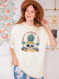 Introducing our Skeleton Beach Shirt - the perfect addition to your summer wardrobe! This stylish and aesthetic t-shirt is perfect for women who love to embrace their edgy side while keeping comfortable during the warmer months. T-Shirt DETAILS -Designs are professionally printed. -Comfortable relaxed fit  -100% Cotton, except heather colors (Cotton Poly blend) -Shirts are a unisex fit, please check the size chart in the images for details. Current processing time:  3-5 Days Shipping Time:  3-5 Days CUSTOM REQUESTS: Currently not accepting unless bulk order(10+ items).  Returns / Defects:  If you are unsatisfied with the shirts' print, please send a photo to my messages.  I am currently accepting returns and exchanges for damaged tees/sweatshirts or print defects.    Let me know if you nee Fun Relaxed Fit Shirt For Vacation, Fun Vacation Tops, Fun Relaxed Fit Tops For Vacation, Fun Summer Vacation Tops, Spring Fun Tops For Beach Party, Fun Crew Neck Top For Vacation, Fun Short Sleeve Tops For Beach Party, Trendy Short Sleeve Tops For Summer Adventures, Fun Relaxed Fit Summer Shirt