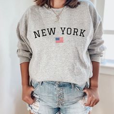 New York Sweatshirt East Coast Sweatshirt New York Crew Neck NYC Sweatshirt NYC Hoodie Oversized Sweatshirt College Sweatshirt NY Sweatshirt Ideal for any situation, a unisex heavy blend crewneck sweatshirt is pure comfort. These garments are made from polyester and cotton. This combination helps designs come out looking fresh and beautiful. The collar is ribbed knit, so it retains its shape even after washing. There are no itchy side seams on these sweaters. .: 50% Cotton 50% Polyester .: Mediu Nantucket Sweatshirt, Nyc Sweatshirt, Alabama Clothes, Nyc Hoodie, Alabama Sweatshirt, Tennessee Shirt, Nyc Shirt, Preppy Sweatshirts, New York Sweatshirt