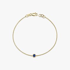 Our simple and elegant solitaire bracelet features a round cut natural blue sapphire at its center. We can craft this bracelet in 14K or 18K Gold according to your preference.★ Bracelet Features• Gold Kt: 14K/18K Solid Gold (All pieces are stamped for authenticity)• Available Gold Colors: Yellow Gold, Rose Gold, White Gold• Center Round Cut Sapphire Weight: 0.15 carat• We only work with real natural sapphires• We offer a signed certificate with each bracelet for the authenticity of the center sapphire stone.• Center Diameter: 4.6 mm Elegant Blue Jewelry With Smooth Bezel, 14k Gold Bracelet With Birthstone, 14k Gold Birthstone Bracelet, 14k Yellow Gold Chain Bracelet With Bezel Setting, 14k Gold Diamond Bracelet With Birthstone, 14k Gold Round Diamond Bracelet With Birthstone, Blue 14k Gold Everyday Bracelets, Yellow Gold Birthstone Chain Bracelet, Timeless Blue Round Bracelets