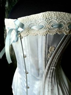 This incredible classic Limited edition Edwardian S bend corset features traditional steel boning, Venise lace detail and 4 detachable wide ribbon garters. This bespoke corset will be custom made just for you by corsetiere la belle fairy Please supply Full bust Natural waist Full hip Waist to midbust Allow 6 to 8 weeks until shipping Free shipping Canada and the United States Last picture shows other colors available...please message me for availability and any other questions Luxury Vintage Lace Corset, Wedding Corset With Delicate Lace, Elegant Corset With Sweetheart Neckline And Delicate Lace, Fitted Lace Corset For Wedding Night, Elegant Blue Corset Dress For Debutante Ball, Fitted Lace Corset For Wedding, Lace Underbust Bodice For Wedding, Fitted Lace Wedding Corset, Elegant Lace Corset For Wedding Night