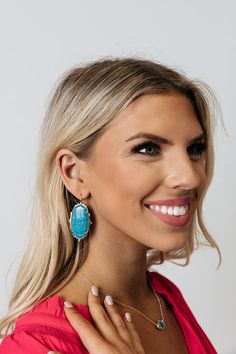 Reminiscent of handwoven kilim motifs, the Baroque Ella Gold Drop Earrings in Teal Howlite are a textural take on Kendra Scott's signature oval shape. Metal: 14k Gold Plated Over Brass Material: Teal Howlite Size: 2.14" L x 1.11" W on earwire Due to the one-of-a-kind nature of the medium, exact colors and patterns may vary slightly from the image shown. Kilim Motifs, Handwoven Kilim, Gold Drop Earrings, Brass Material, Kendra Scott, Oval Shape, Gold Plate, Hand Weaving, Size 2