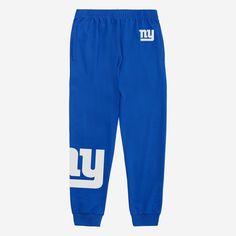 It's time to get stylish while you absolutely crush that workout. Flex your fandom in these New York Giants Team Color Joggers. Features All-over, team-colored design so you can rep the team in style Team logo display on upper left leg, in case there were any doubts where your allegiances lie Bold team logo display on right leg so you can show off your team pride with every stride Elastic waistband to keep you comfortable Details Material: 65% Cotton/35% Polyester Officially licensed Imported Team-colored Bottoms For Game Day, Sporty Cotton Bottoms For Game Day, Blue Team Spirit Sports Bottoms, Sporty Pants With Logo Print For Sports, Team-colored Sports Bottoms With Team Name, Sports Cotton Pants With Logo Print, Blue Sporty Activewear With Letter Print, Sporty Moisture-wicking Activewear For Game Day, Team-colored Sports Bottoms With Team Logo