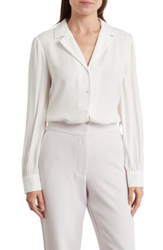 Chic Semi-formal Tops With Hidden Button Closure, Chic Solid Blouse With Collared Neckline, Chic Solid Color Blouse With Collared Neckline, Elegant V-neck Top With Cuffed Sleeves, Chic Button-up Blouse With Hidden Buttons, Elegant White Blouse With Hidden Buttons, Elegant V-neck Shirt With Back Button Closure, Elegant Semi-formal Blouse With Button Closure, Elegant Button-up Blouse With Hidden Closure