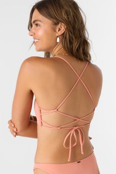 Just beachy. This essential bikini top has a strappy back design for a secure and supportive fit. O'Neill Women's bikini top Saltwater Solids Collection Removable bra pads Strappy back with self tie O'Neill Blue: 85% Recycled Polyamide, 15% Elastane Tactel | O'Neill Women's Saltwater Solids Huntington Bralette Top in Canyon Clay, Size Small, Elastane/Polyamide Vacation Swimwear With Built-in Bra And Strappy Back, Summer Swimwear With Built-in Bra And Strappy Back, Summer Tankini With Built-in Bra And Strappy Back, Yoga Bra With Strappy Back, Beach Swimwear With Adjustable Straps And Cross Back, Cross Back Swimwear With Adjustable Straps For The Beach, Poolside Strappy Tie-back Halter Top, Poolside Strappy Back Tie Halter Top, Beach Tankini With Bra Friendly Strappy Back