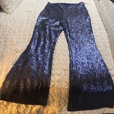 Perfect For Nye!! New With Tags Side Zip On Waist And Great Bell Bottom Shape! Color Is Bluish Purple Blue Sequined Wide Leg Bottoms, Glamorous Blue Bottoms For Night Out, Fitted Blue Sequin Bottoms, Blue Long Pants For Parties, Blue Long Pants For Party, Blue Party Long Pants, Blue Sequin Pants For Night Out, Glamorous Blue Pants For Party, Glamorous Blue Sequined Pants