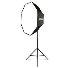 an octagonal light stands on a white background with a black tripod in the foreground