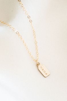 A sweet way to tell your mom you love her this Mother's Day! Our MAMA Necklace is the perfect dainty necklace for all the mamas out there! It makes an amazing gift - even if it's to yourself! 😉 You'll never want to take it off, and you won't have to, either! Gold filled & sterling are perfect for everyday wear. Dainty Hand Stamped Charm Necklaces For Everyday, Everyday Meaningful Nickel-free Charm Necklaces, Dainty Hand Stamped Charm Necklace For Everyday, Delicate Pendant Charm Necklace As Gift For Mom, Meaningful Everyday Pendant Necklace, Everyday Meaningful Sterling Silver Charm Necklaces, Everyday Meaningful Sterling Silver Charm Necklace, Dainty Everyday Charm Necklaces For Mother's Day, Simple Charm Necklaces For Mother's Day