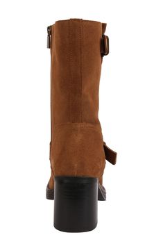 Add the edginess you crave to your ensemble with this leather boot brightened with polished buckles and lifted on a chunky block heel. 2 1/2" heel 7 3/4" shaft Cushioned footbed Leather upper/synthetic lining/rubber sole Imported Brown Wide Calf Heeled Boots With Buckle, Brown Wide Calf Heeled Boots With Buckle Closure, Brown Heeled Boots With Buckle For Work, Brown Heeled Boots With Buckle Closure For Work, Brown Heeled Boots With Buckle Closure, Brown Moto Boots With Buckle Closure Medium Width, Brown Heeled Boots With Buckle For Fall, Brown Ankle Moto Boots With Buckle Closure, Brown Ankle Moto Boots With Buckle