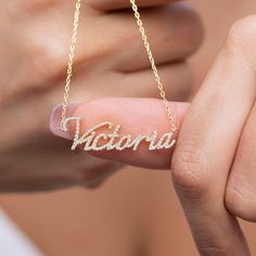 This 14k personalized diamond name necklace is the perfect gift for the bridal party, someone special, or yourself. How to order 1- Pick the fonts you like and send us a message 2- We will send you a picture of your name with the fonts you chose 3- If you like it any of them, place your order. 4- We send a final 3d mock up for approval. 5- Once approved we go ahead and finish your necklace. __________________________________________ M A T E R I A L & L E N G T H Available in 14k Yellow Gold, 14k Rose Gold Name Necklace For Anniversary, Customizable Rose Gold Name Necklace For Anniversary, Elegant Customized Name Necklace For Anniversary Gift, Customizable Nameplate Necklace For Anniversary, Elegant Personalized Name Necklace For Anniversary, Personalized Nameplate Necklace With Custom Text, Customizable Elegant Name Necklace For Anniversary, Customizable Rose Gold Name Necklace For Wedding, Rose Gold Initials Name Necklace For Anniversary