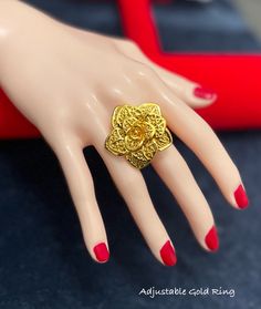 Gold Flower Ring for Women, 24k Dubai Gold Plated Ring, Indian Bridle Ring, Wedding Ring, African Jewelry, Nigerian Jewelry, Arab Fashion Make a bold statement with this stunning gold jewelry ring. Perfect addition to any outfit. This ring sure to turn heads. its unique design and intricate details make it a true statement piece.  don't wait any longer to add this stunning piece to your collection.  You will love this Gold ring because is something that matches many outfits and styles.  Suitable Elegant Gold Flower Ring For Wedding, Gold Flower-shaped Ring For Gift, Gold Flower Shaped Ring For Gift, 22k Gold Filigree Ring For Wedding, Gold Open Ring Flower Ring For Formal Occasions, Gold Open Ring Flower Design For Formal Occasions, Gold Flower Ring For Wedding, Gold-plated Flower Open Ring, Gold Plated Open Flower Ring