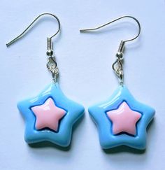 Pastel colours pink and blue star earrings. See video clip and photos close-up for detail. Very light weight to wear. Silver plated fishhooks, see photos close-up for detail. Blue Star Earrings, Cherry Earrings, Fruit Earrings, Pink Star, Neon Rainbow, Pastel Colours, Matching Headband, Pink Stars, Vacation Mode