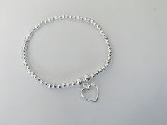 The 925 heart bracelet is worn as a symbol of love and friendship, the perfect gift for yourself or a loved one! African Braids Hairstyles, Heart Bracelet, Love Symbols, Stylish Jewelry, Heart Charm Bracelet, Bracelet Stack, Silver Heart, Journal Notebook, Heart Charm