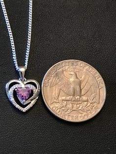 "Sterling Silver Amethyst CZ Heart Necklace Metal: All components are made from solid .925 Sterling Silver Stone: Cubic Zirconia Measurement: pendant is 17mm (0.67\")long including bail and 12mm (0.47\") wide Choose Chain Length Please feel free to Convo me with any questions before purchasing. Please view policy before purchasing You can find other CZ and Birthstone Jewelry in my shop here https://www.etsy.com/shop/LinksAndStones?ref=seller-platform-mcnav&section_id=24399452 Thank You For V Purple Heart Cut Sterling Silver Necklace, Purple Amethyst Heart Necklace, Elegant Heart-shaped Amethyst Necklace, Purple Amethyst Heart Pendant Necklace, Heart-shaped Amethyst Necklace For Gifts, February Birthstone Necklace, Purple Necklace, February Birth Stone, Opal Necklace